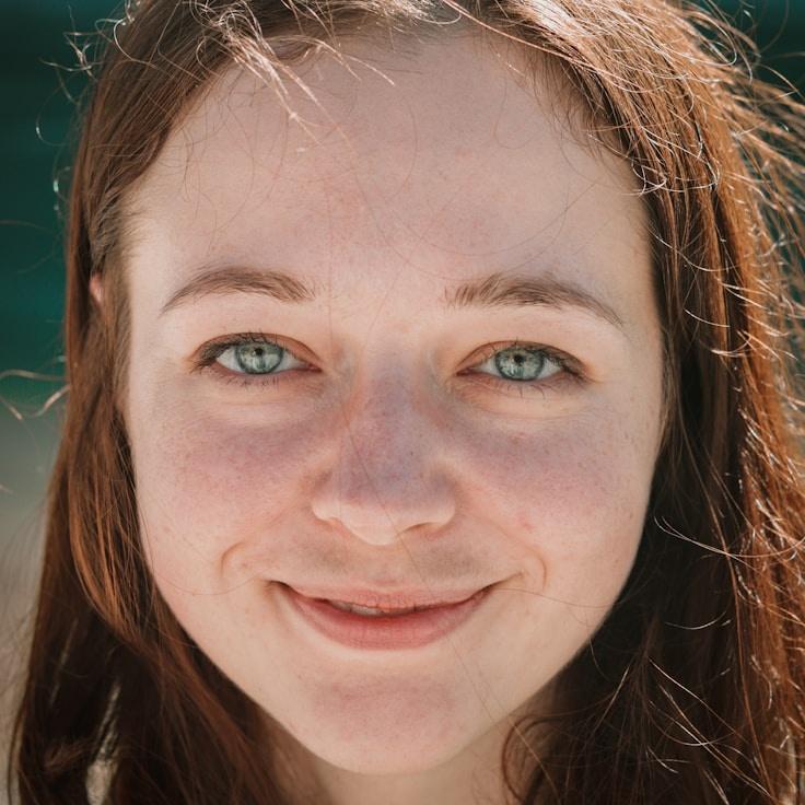 Kaveri Mehta, Lead Design Curator at SolarParcelCore, reviewing corporate floral arrangements